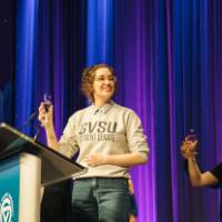 Outgoing Student Senate President Rachel Jenkins toasting President Haas.